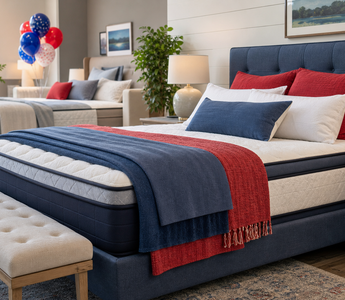 Patriotic showroom bed styled for a Memorial Day mattress sale