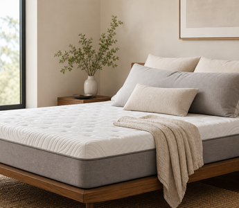 Supportive mattress and pillows in bedroom for side sleeper guide
