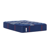 Isolated angled view of the Sealy Posturepedic® Elite Albany 14-inch Firm Mattress, featuring its deep blue quilted surface with contrasting red and white accents, clearly showcasing its sleek, supportive design and brand label.