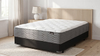 Jamison Easton Firm Mattress bare mattress on foundation in styled bedroom, Mattress Overstock Kentucky