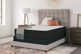 Sierra Sleep Limited Edition Firm Mattress, angled bedroom view on upholstered frame