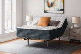 Sierra Sleep Hybrid 1400 Mattress, raised on an adjustable base showing flex