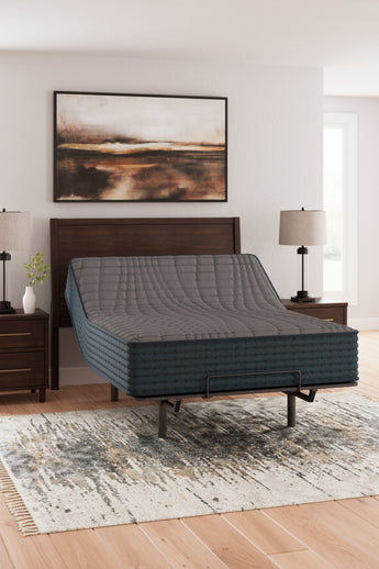 Sierra Sleep Gray 1200 Hybrid Mattress flexed on an adjustable base