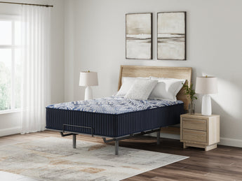 Sierra Sleep Firm Luxe 2.0 Mattress shown on an adjustable base