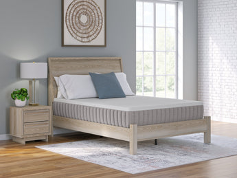 Sierra Sleep Terra Sleep Firm Mattress, on a bed frame in a bedroom setting