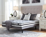 Sierra Sleep 8 Inch Chime Innerspring Mattress on an adjustable base in a bright bedroom