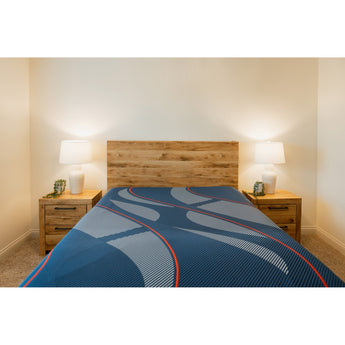 Couple resting on the Brenham II Hybrid Soft — pressure-relief side-sleeper lifestyle
