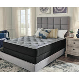 Sierra Sleep Comfort Plus Mattress on an upholstered platform bed frame, bedroom lifestyle view