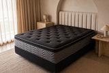 Jamison Clarion Eurotop mattress in a styled bedroom, top view of the quilted sleep surface