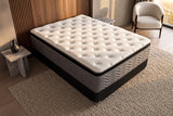 Jamison Easton Pillowtop mattress in a styled bedroom, top view of the quilted sleep surface