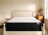 Jamison Sleep Response 4-Star mattress, foot-of-bed view in a styled bedroom
