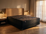 Jamison Sleep Response Fusion Elite mattress, three-quarter view in a styled bedroom