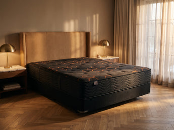 Jamison Sleep Response Fusion Elite mattress, three-quarter view in a styled bedroom
