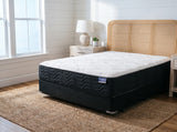Jamison Sleep Response Premier Firm mattress, three-quarter view in a styled bedroom