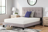 Sierra Sleep Chime 8 Inch Memory Foam Mattress made up on an upholstered bed frame in a furnished bedroom