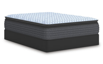Sierra Sleep Destin Cove PT Mattress on foundation, side view showing the wrapped coil hybrid construction