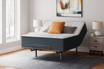Sierra Sleep Hybrid 1400 Mattress, raised on an adjustable base showing flex
