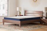 Sierra Sleep Ashley Firm Mattress, Queen on wood platform bed in a bedroom setting