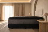 Jamison Clarion Eurotop mattress in a styled bedroom, side profile showing the mattress height