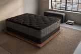 Jamison Clarion Firm mattress in a styled bedroom, top view of the quilted sleep surface