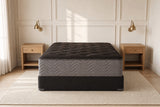 Jamison Clarion Plush mattress in a styled bedroom, foot-of-bed view