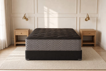 Jamison Clarion Plush mattress in a styled bedroom, foot-of-bed view
