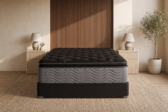 Jamison Clarion Ultra Plush Pillowtop mattress in a styled bedroom, foot-of-bed view