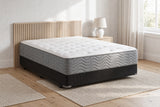 Jamison Easton Firm mattress in a styled bedroom, styled bedroom angle