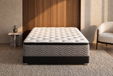 Jamison Easton Pillowtop mattress in a styled bedroom, foot-of-bed view