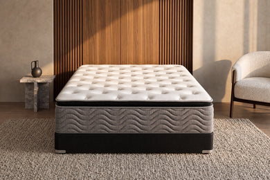 Jamison Easton Pillowtop mattress in a styled bedroom, foot-of-bed view