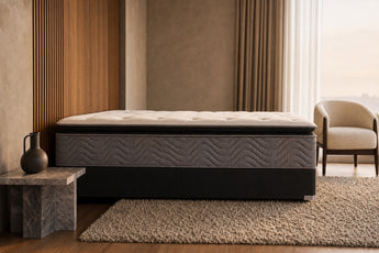 Jamison Easton Pillowtop mattress in a styled bedroom, side profile showing the mattress height