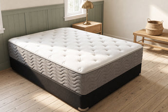 Jamison Easton Plush mattress in a styled bedroom, top view of the quilted sleep surface