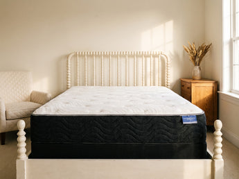 Jamison Sleep Response 4-Star mattress, foot-of-bed view in a styled bedroom