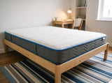 Jamison Sleep Response Aria mattress, three-quarter view in a styled bedroom