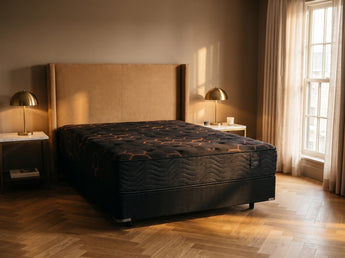 Jamison Sleep Response Fusion Elite mattress, foot-of-bed view in a styled bedroom