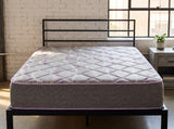 Jamison Sleep Response Lyric mattress, foot-of-bed view in a styled bedroom