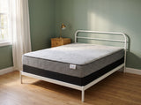 Jamison Sleep Response React Cushion Firm mattress, three-quarter view in a styled bedroom